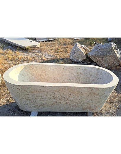 Hand-carved travertine soaking tub with triple-polished finish from Queretaro Mexico